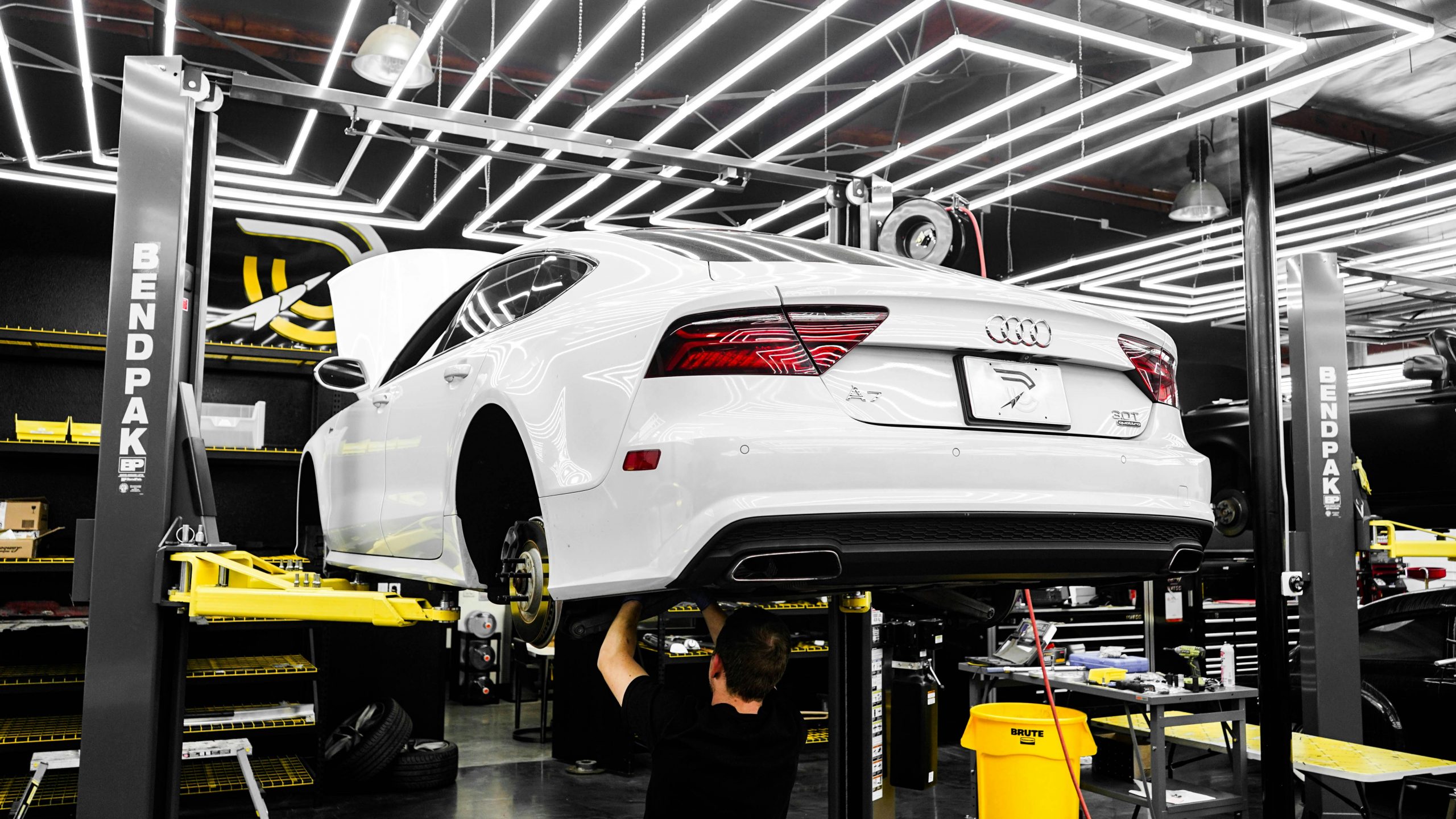 photo of car in an auto repair garage